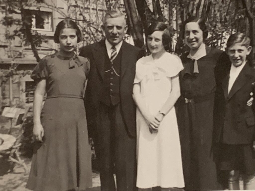 The Dreifuss Family 1935 A black and white photo of the Dreifuss family from 1935